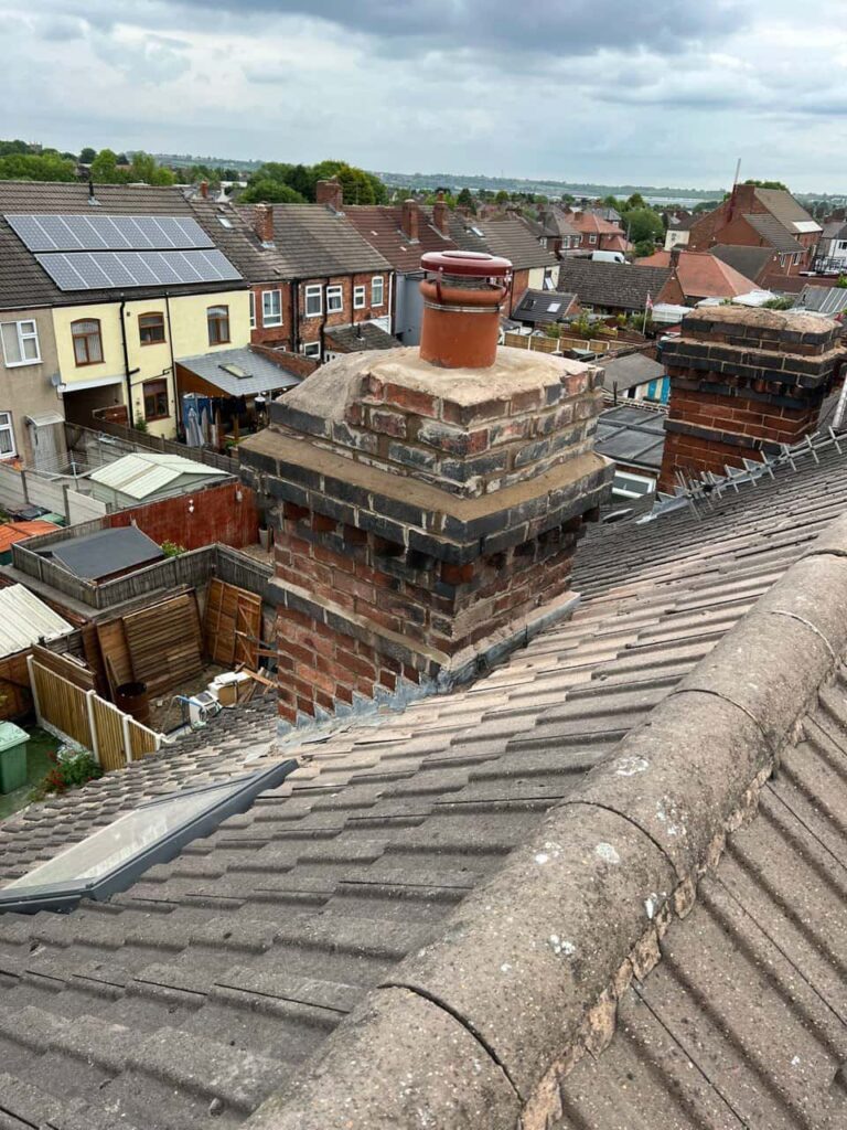 This is a photo taken from a roof which is being repaired by North Hykeham Roofing Repairs, it shows a street of houses, and their roofs